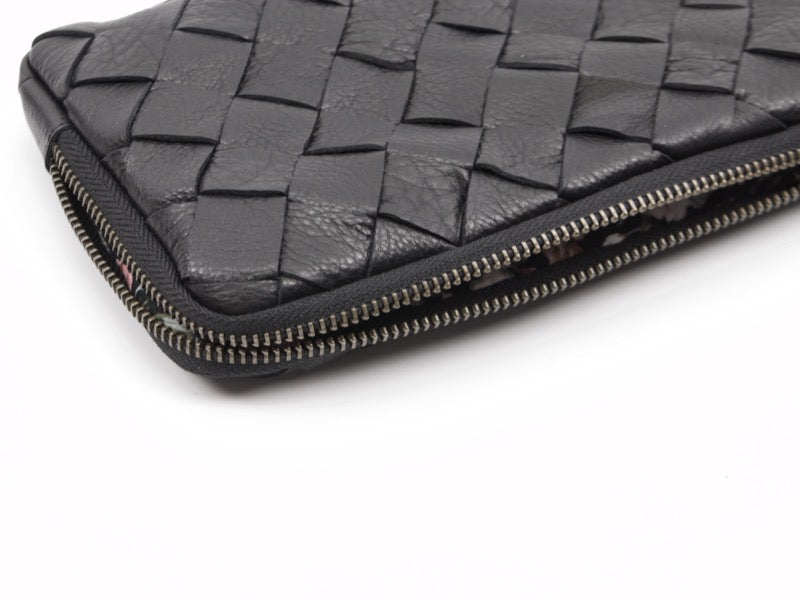 Cartera de mano tejida a mano Milloo Chloe en color negro